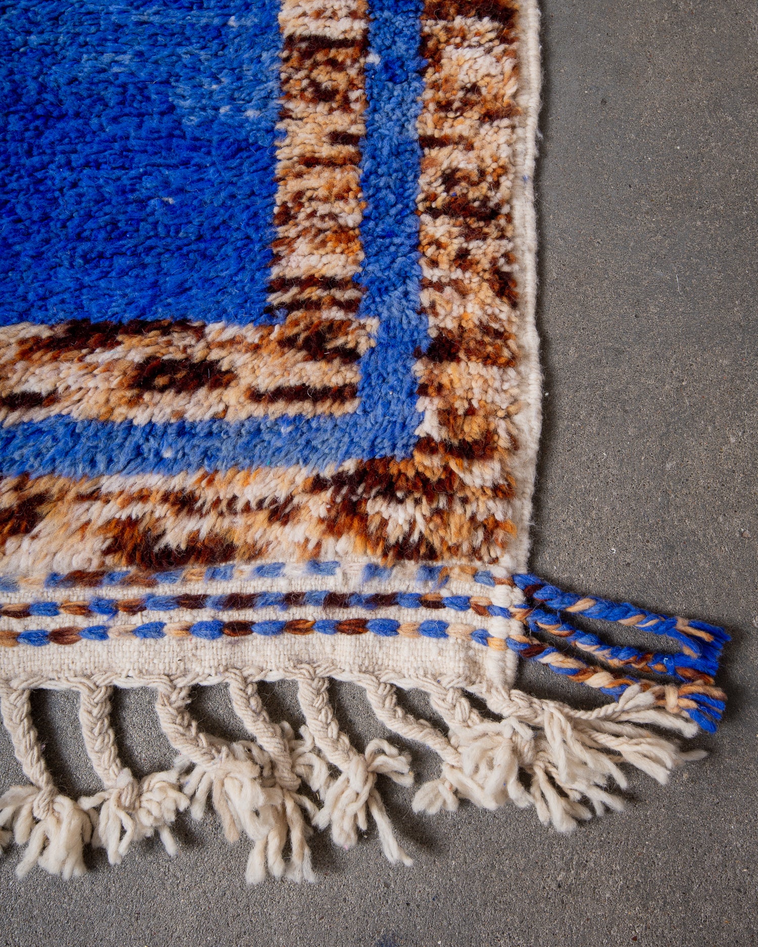 Modern, designer, handcrafted Berber rug from Morocco. Beniourain carpet with beautiful colours and patterns and fluffy wool texture.